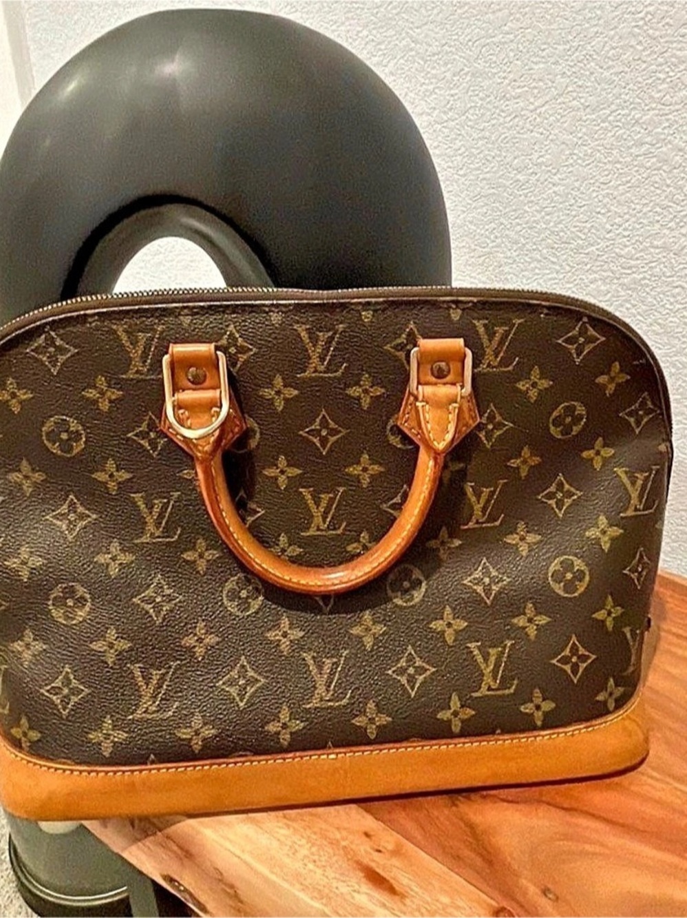 Louis Vuitton Alma PM Satchel in Brown